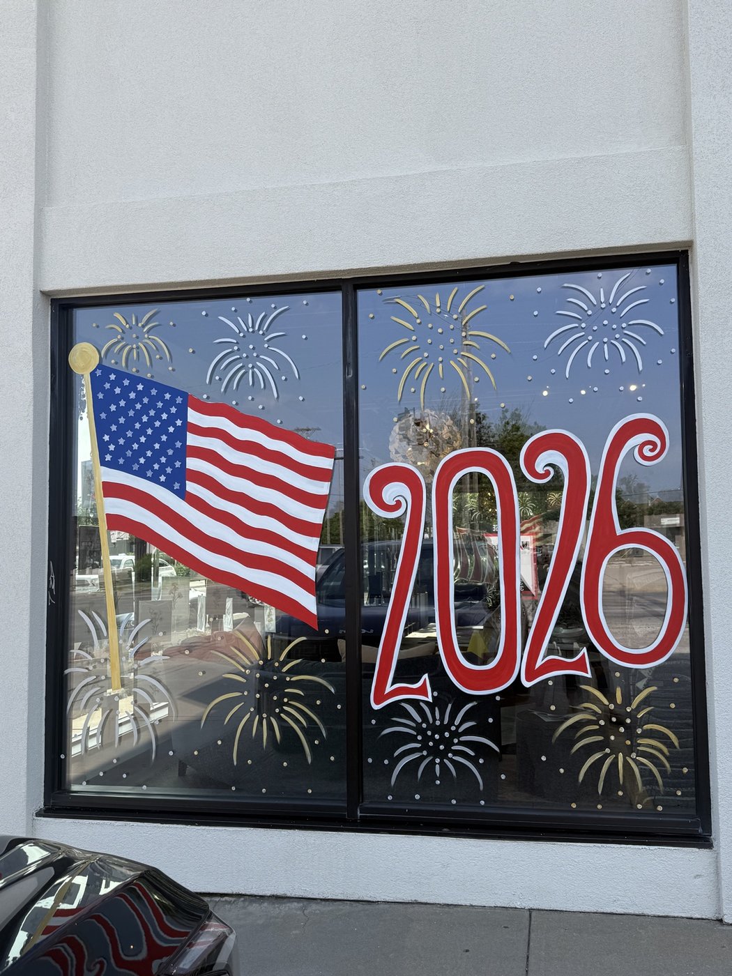2026 New Year window painting with American flag and fireworks
