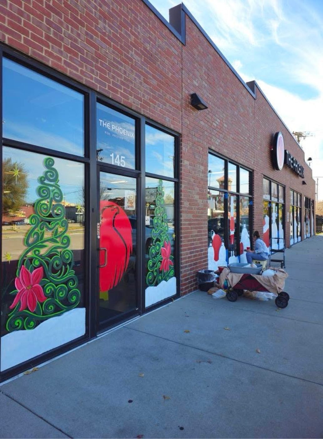 Painting Christmas windows at The Phoenix