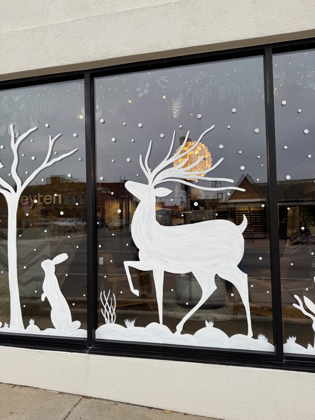 Reindeer and rabbit window painting