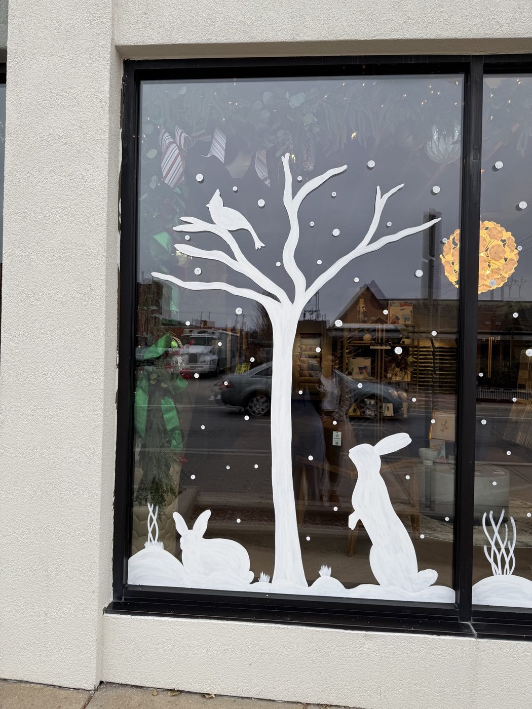White tree window painting with cardinal and rabbits